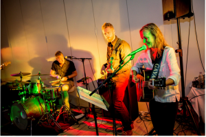 bridges the drum and the guitar